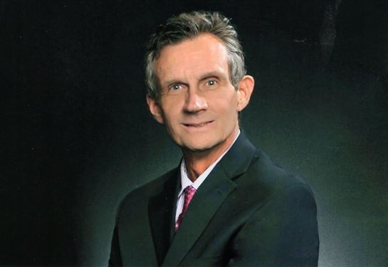 A man in a suit and tie