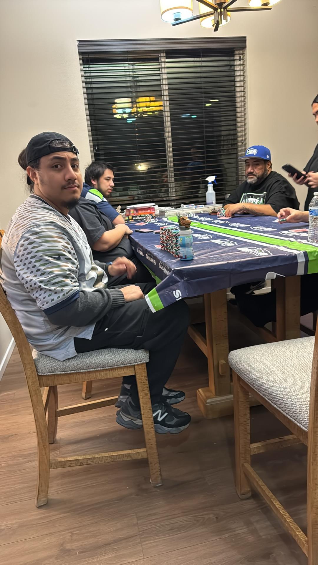 A group of men sitting at a table