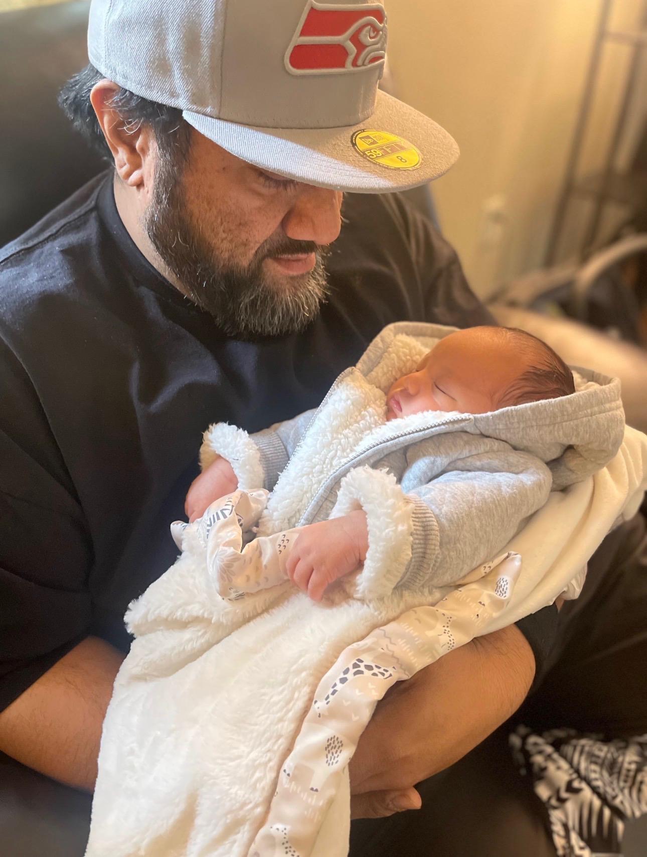 A man holding a baby