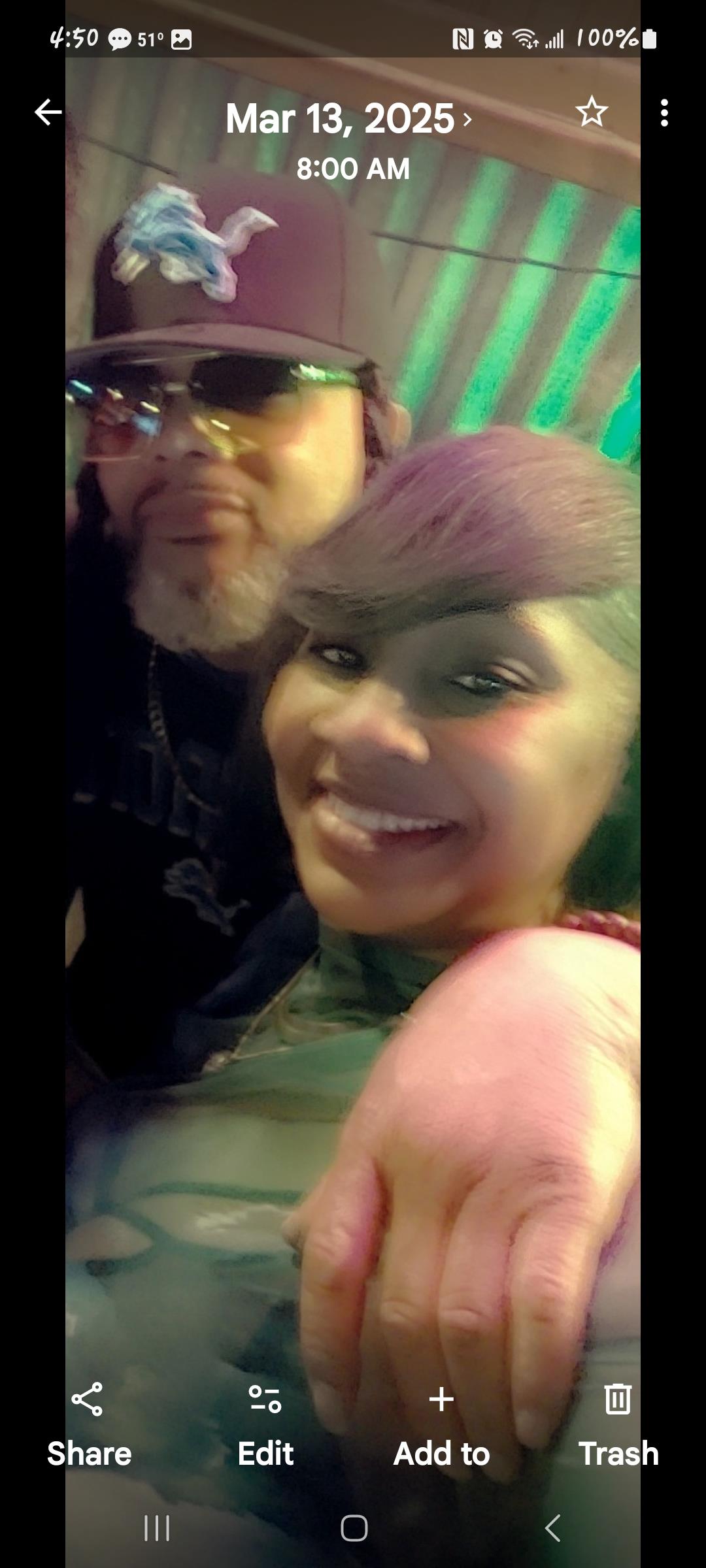 A man and woman taking a selfie