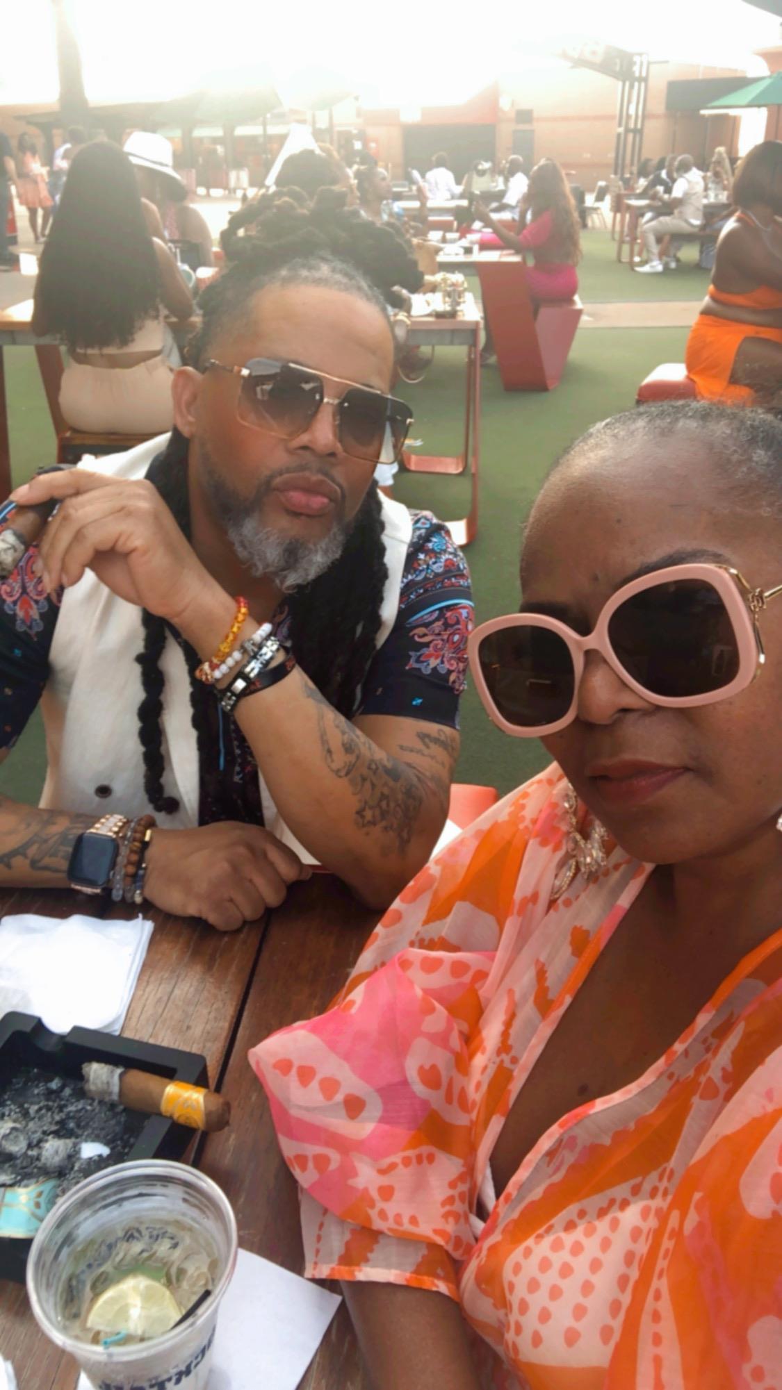 A man and woman sitting at a table