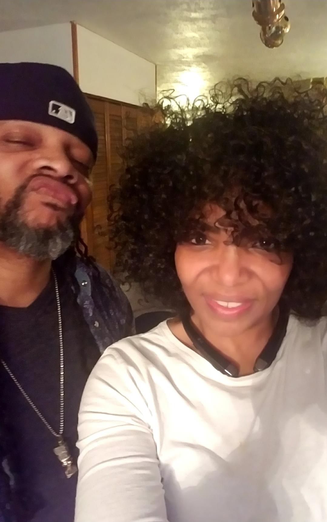 A man and woman taking a selfie