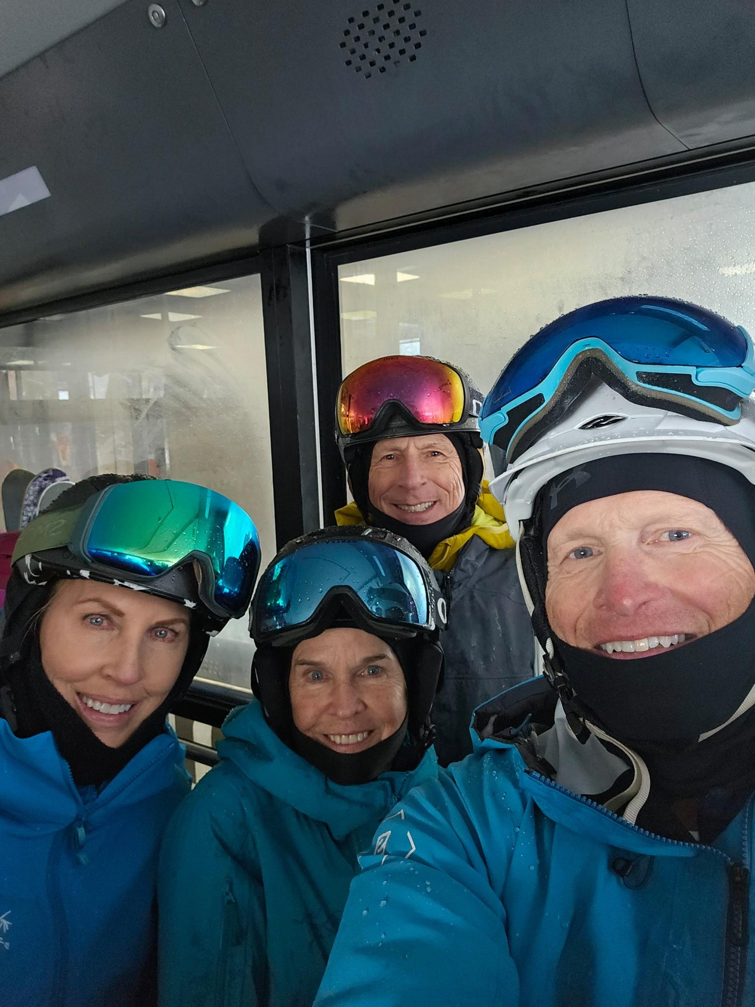 A group of people wearing ski gear