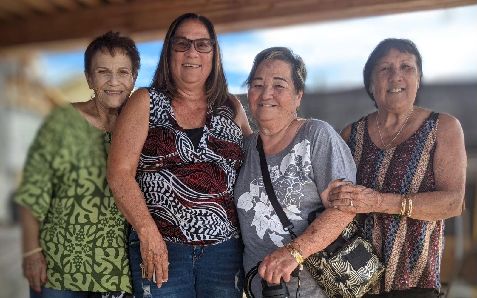 A group of women posing for a photo