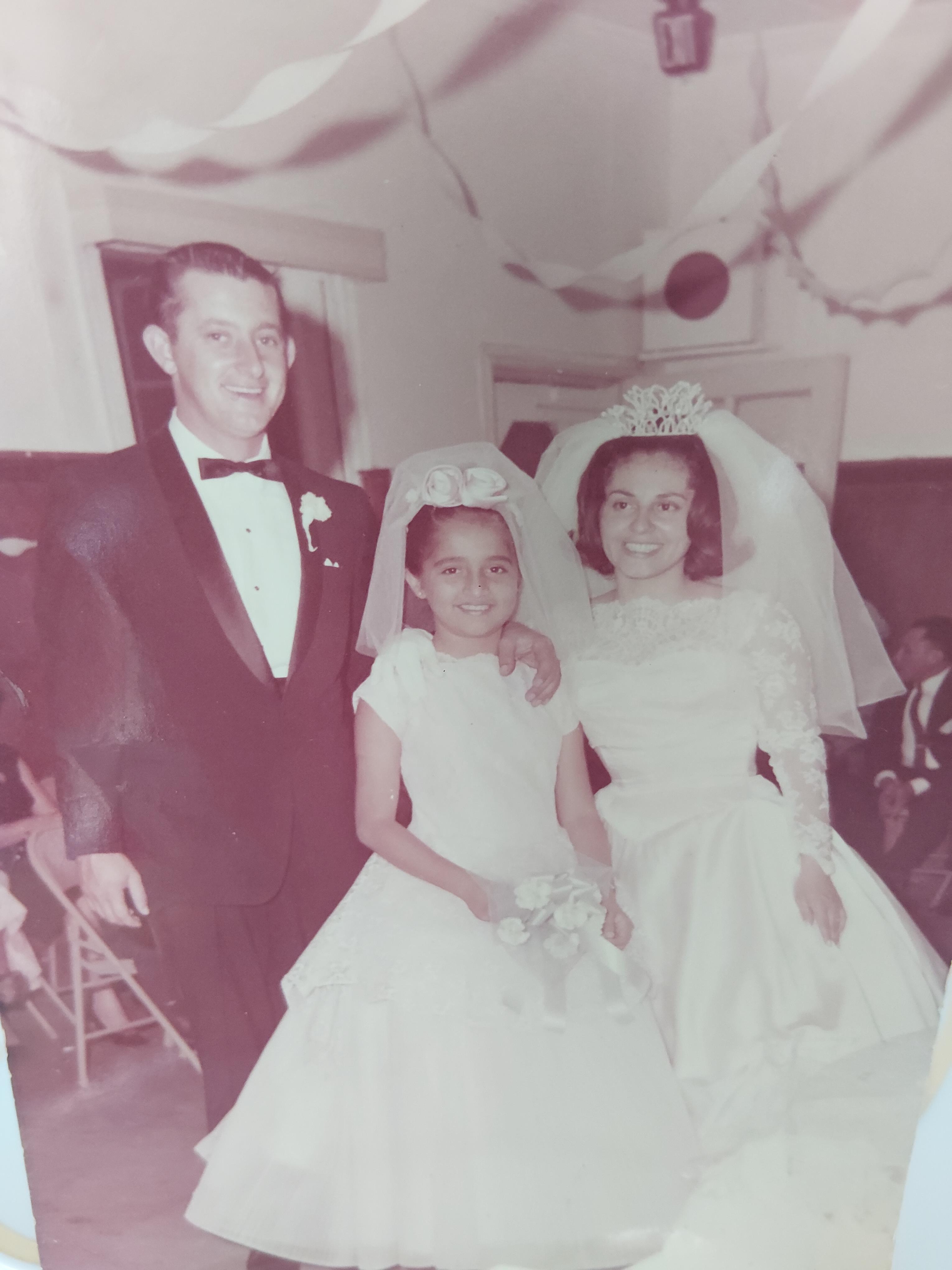 A man and woman in wedding attire