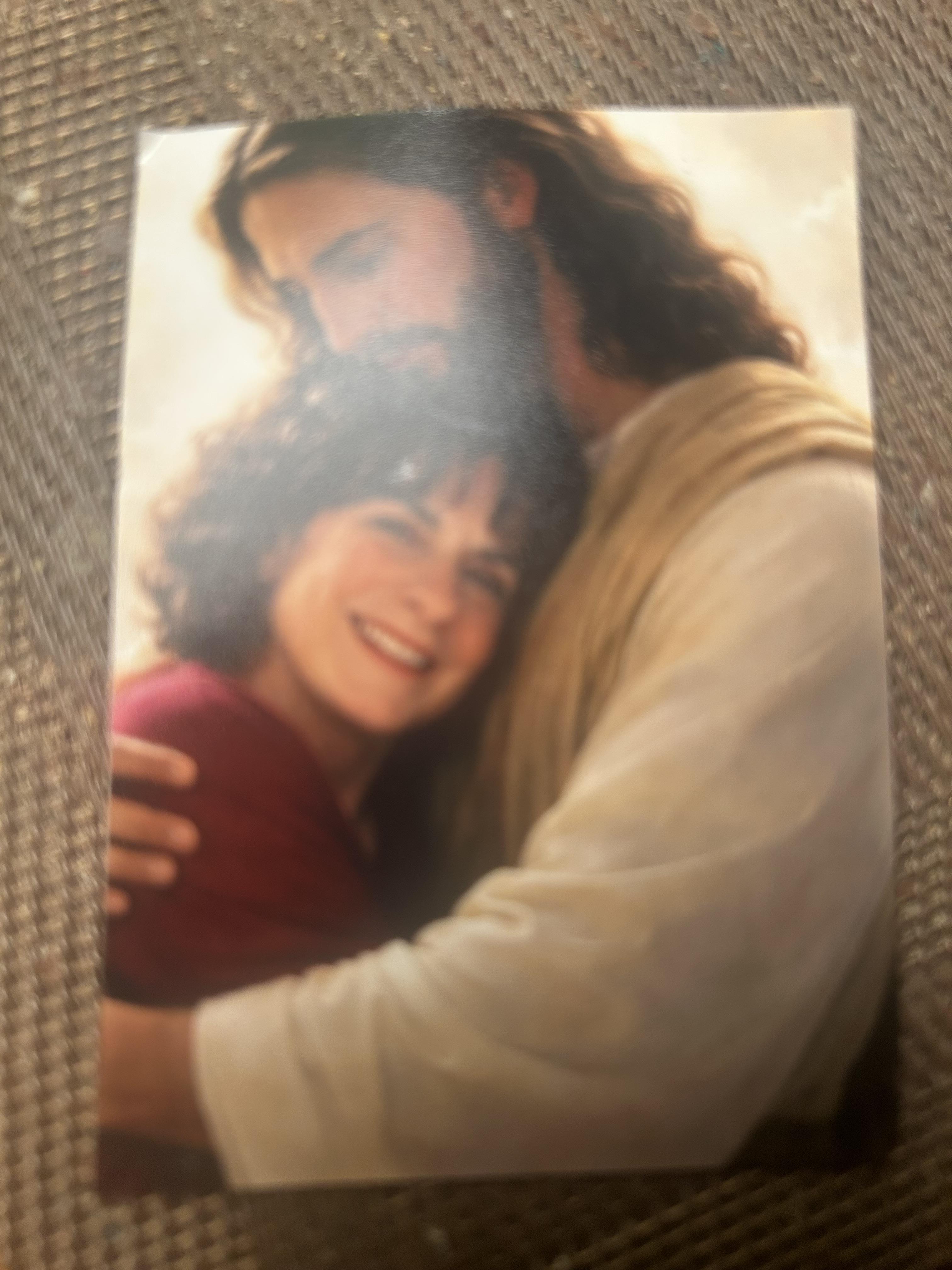 A man and woman hugging
