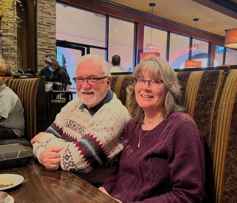 A group of people sitting at a table