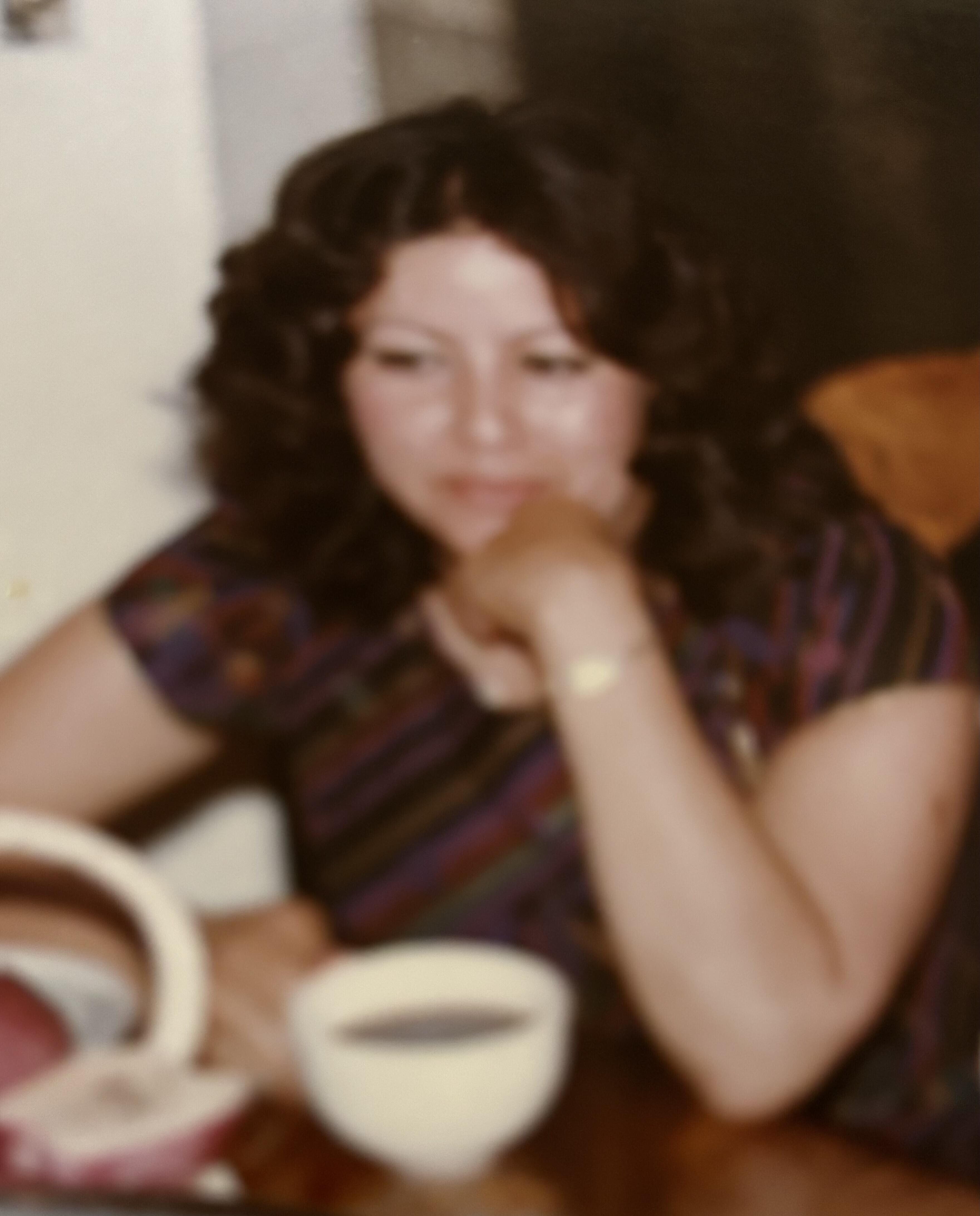 A woman sitting at a table