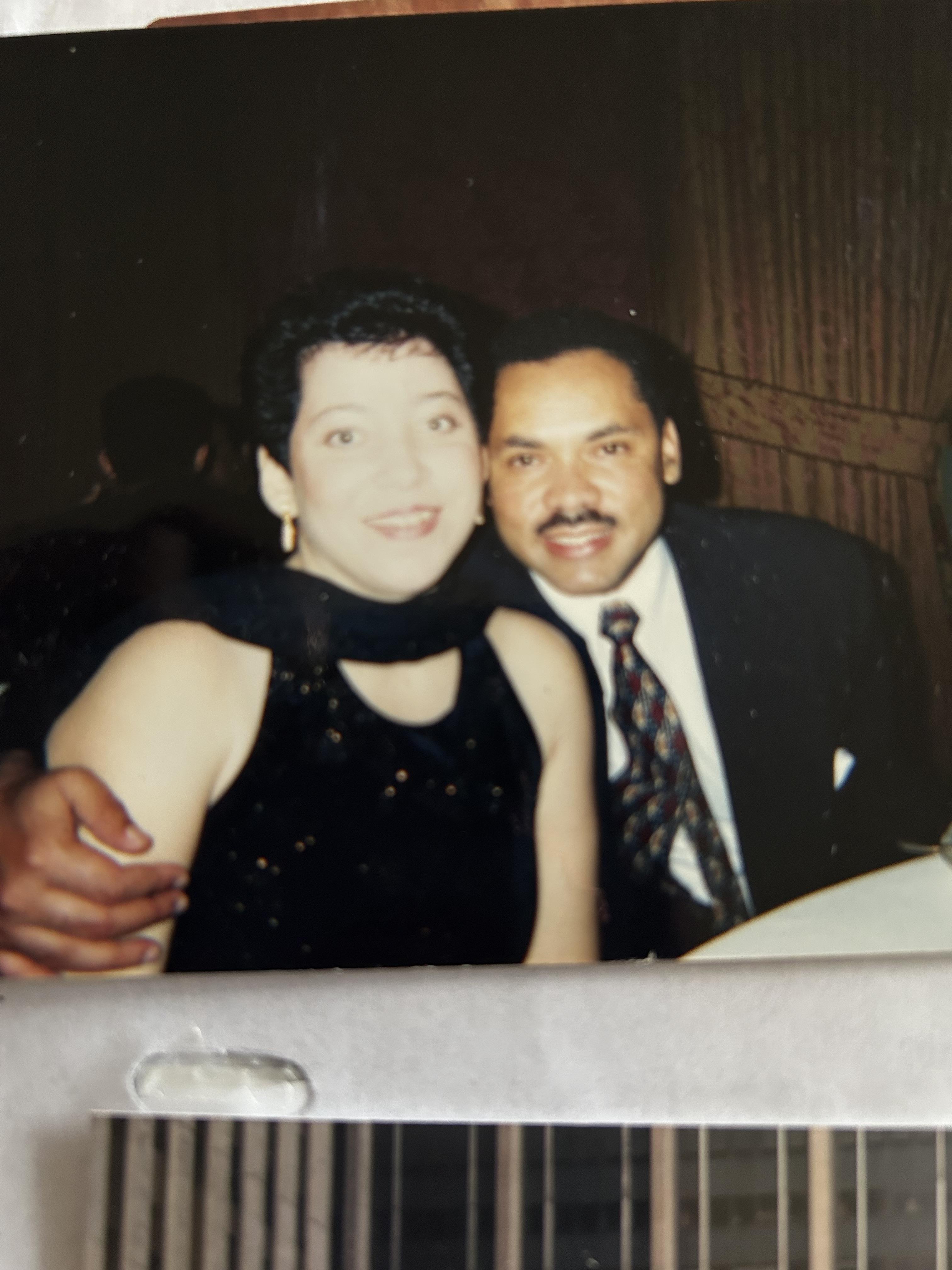 A man and woman posing for a picture