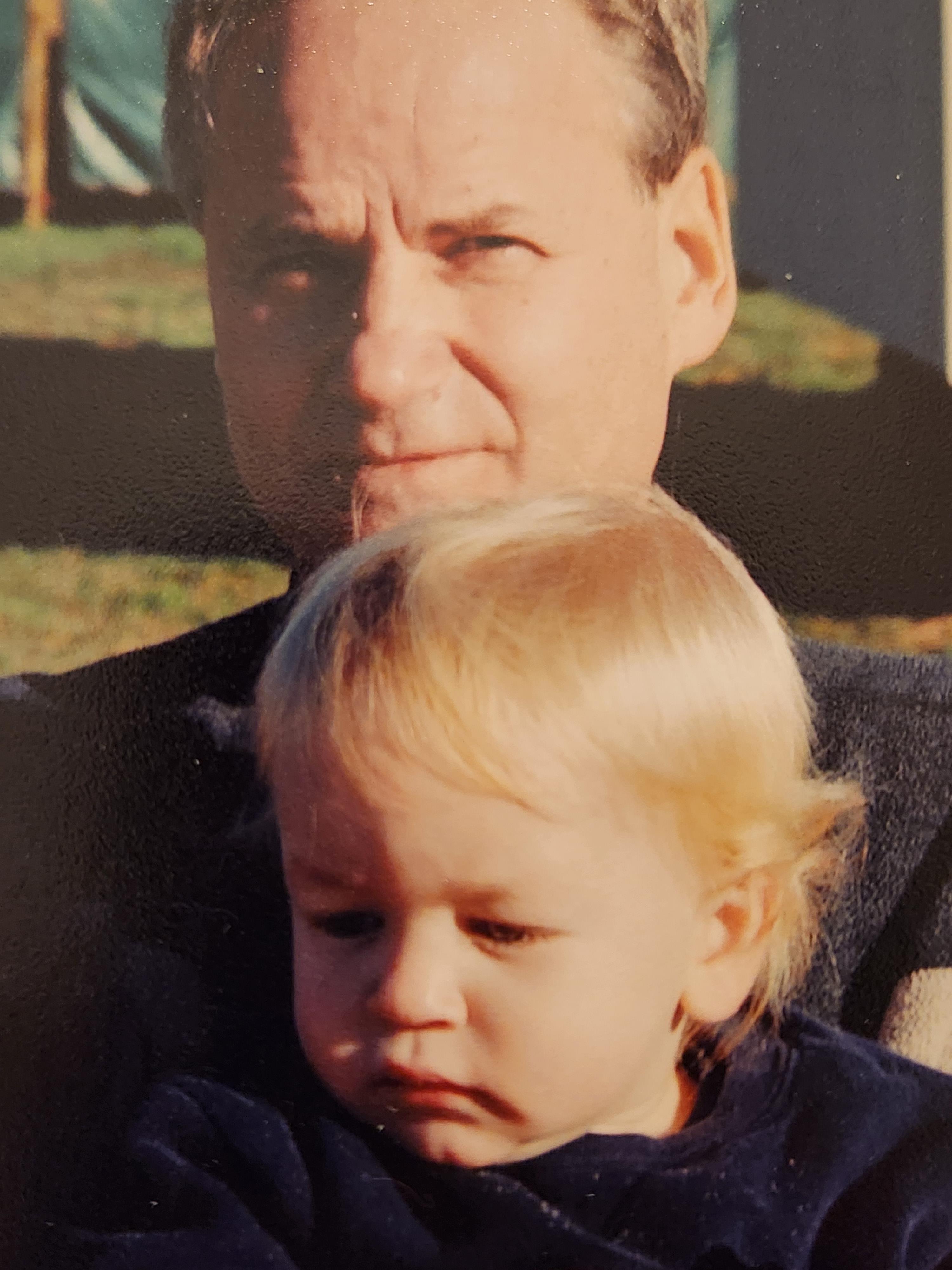 A man holding a baby