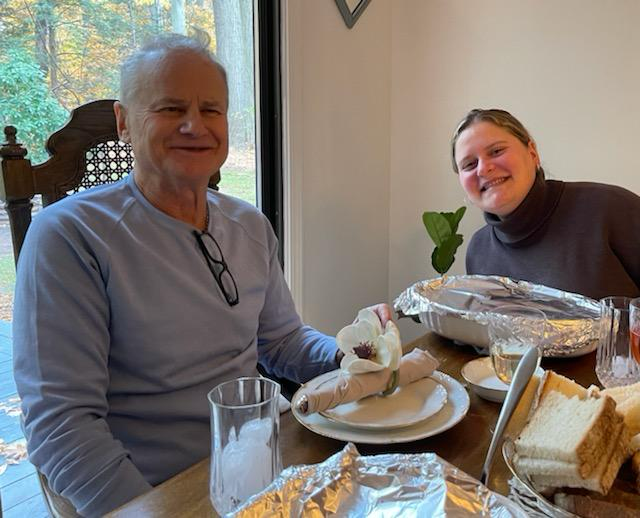 A man and woman sitting at a table
