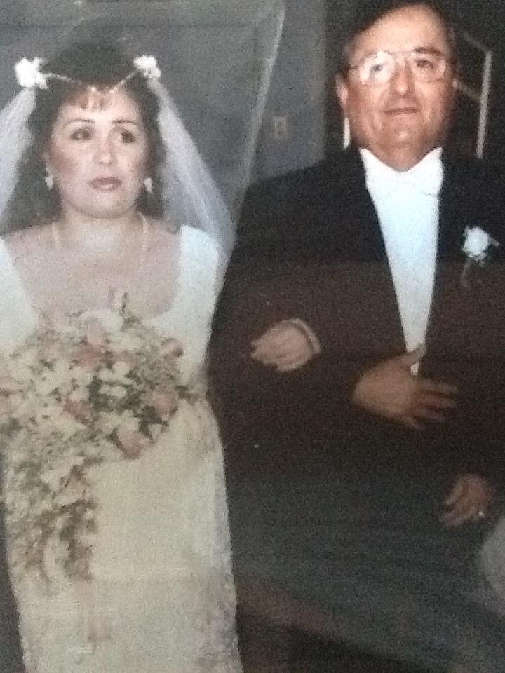 A man and woman in wedding attire