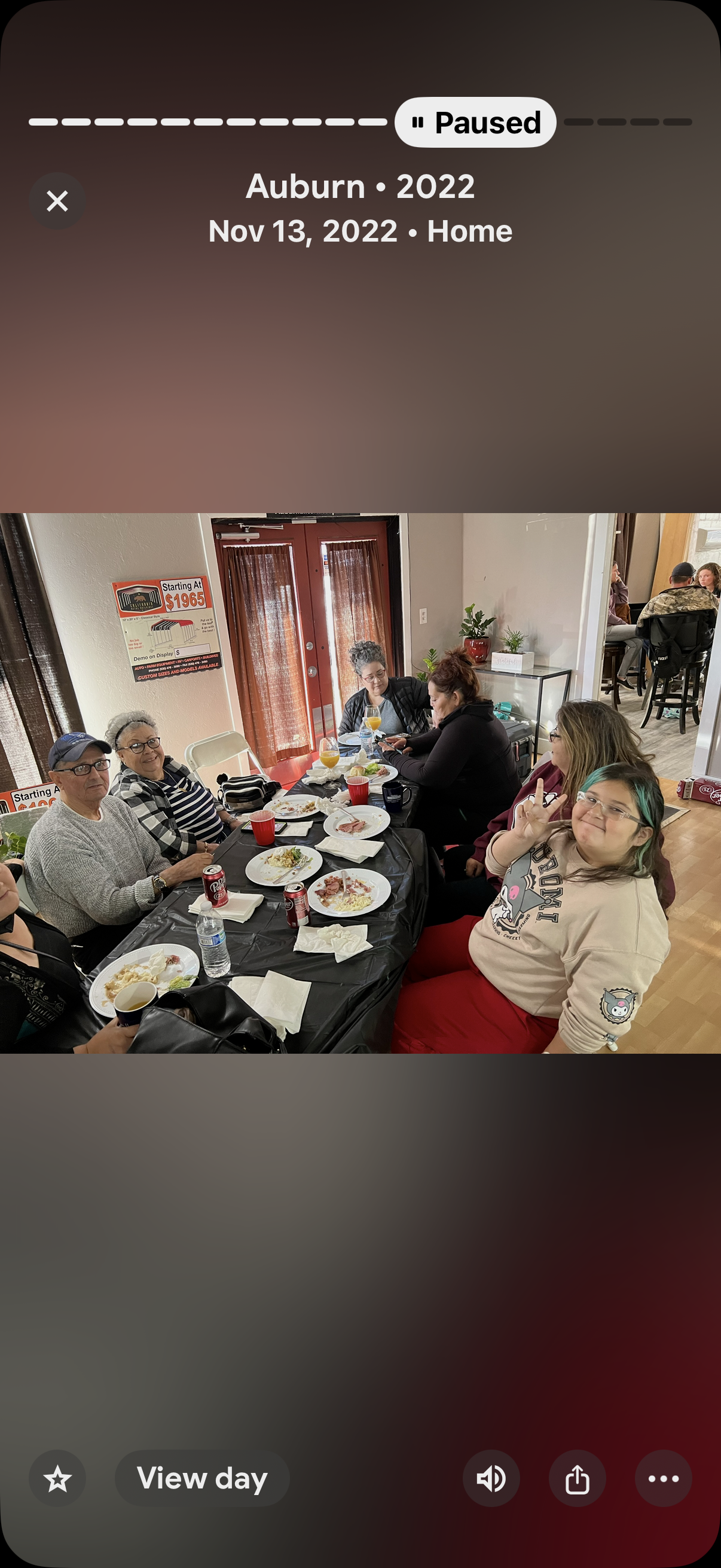 A group of people sitting at a table eating food