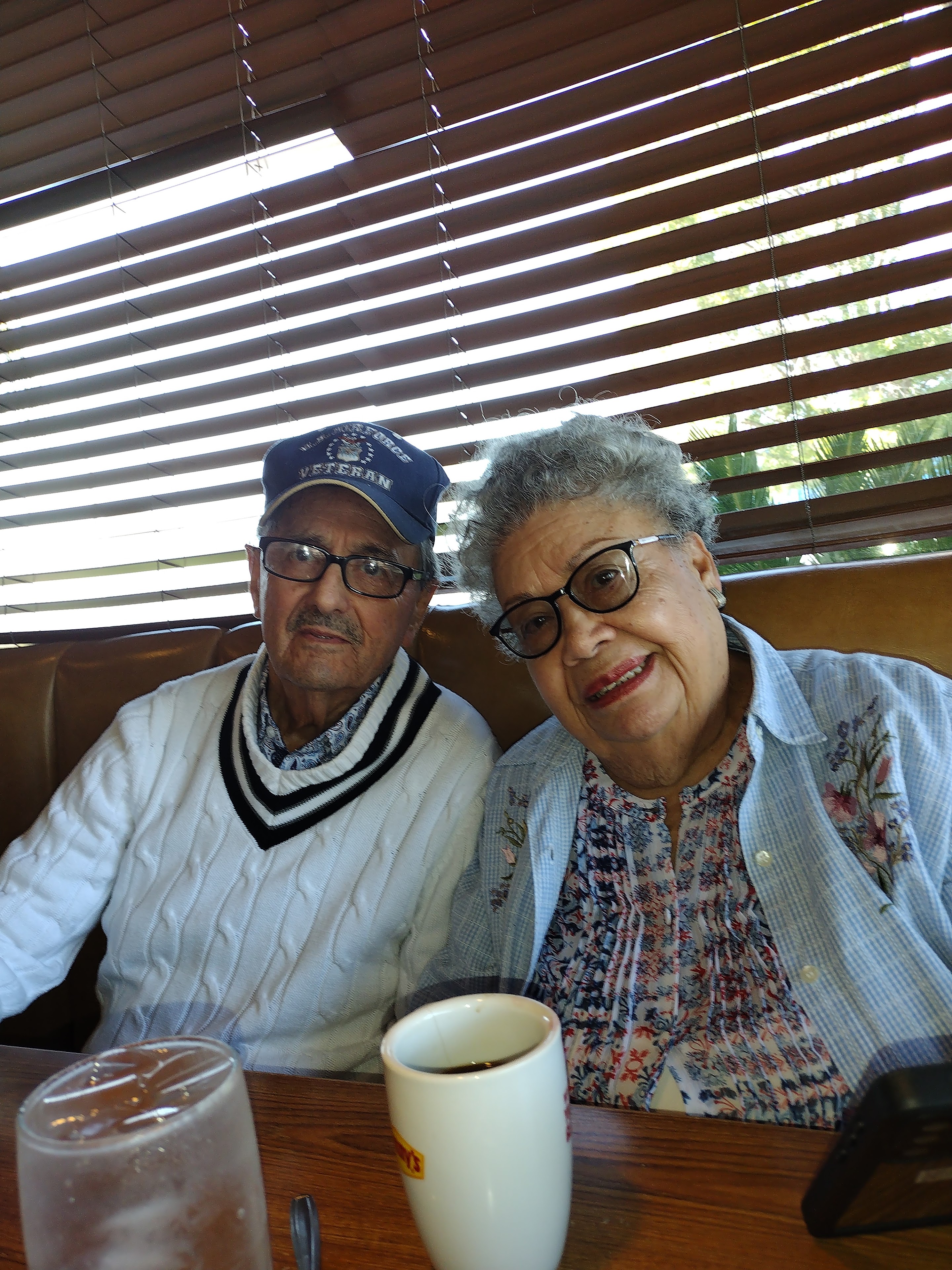 A man and woman sitting at a table