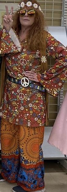 A person wearing a hippie outfit