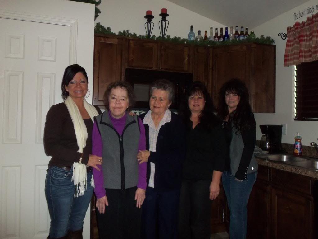 A group of women posing for a photo