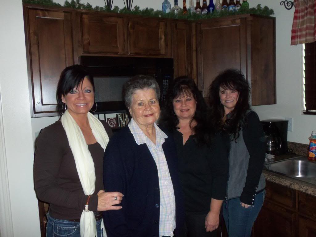 A group of women posing for a photo