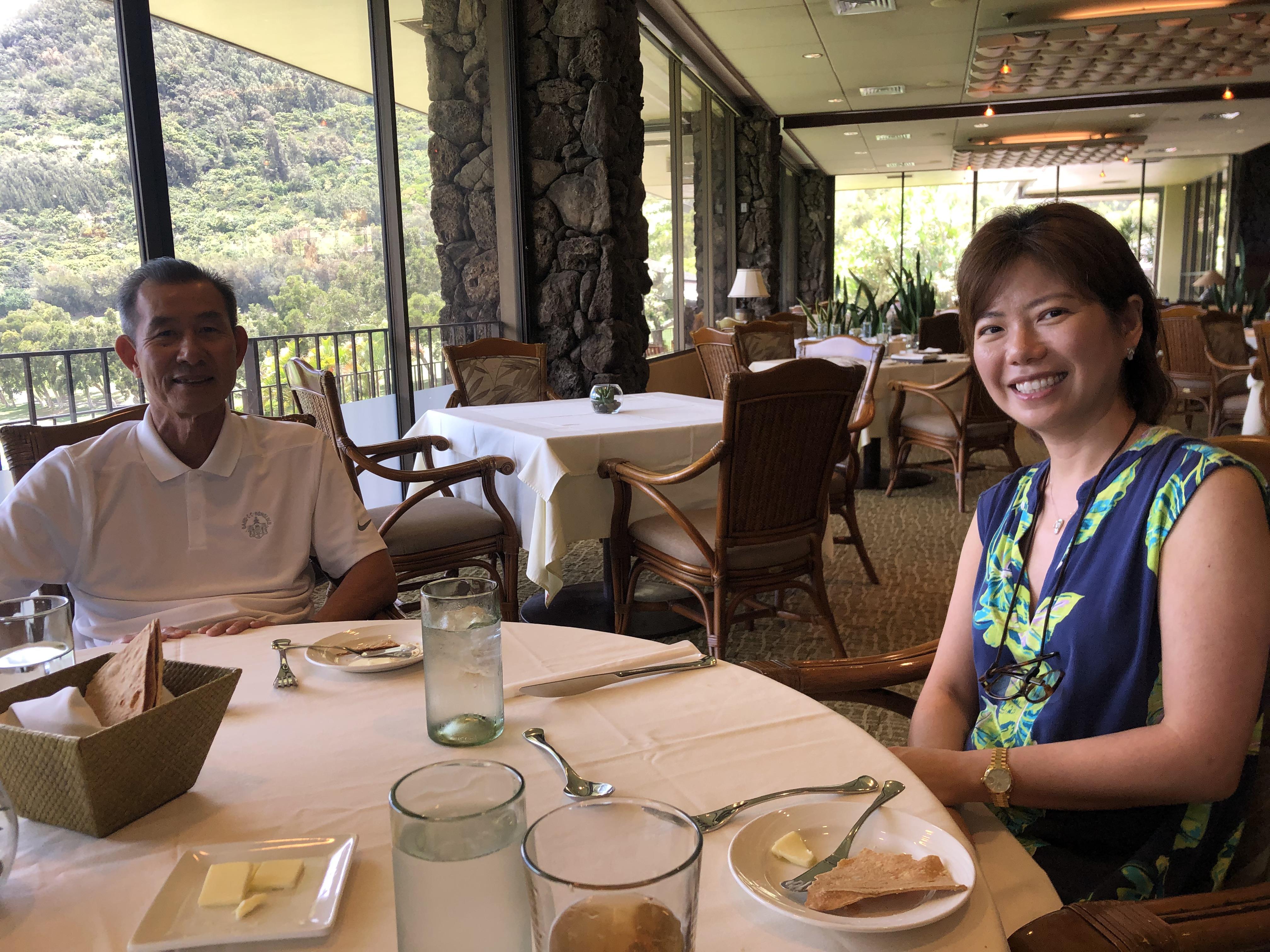 A man and woman sitting at a table