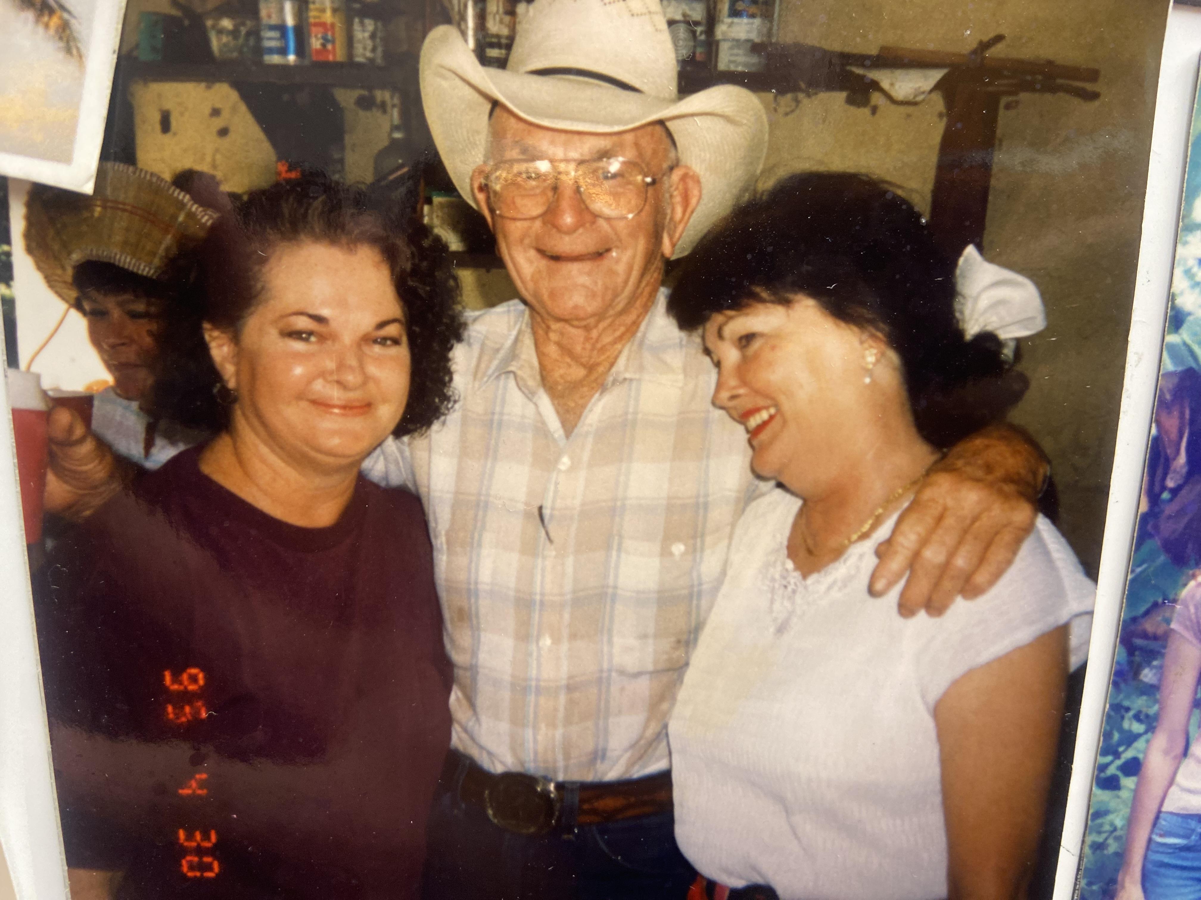 A man with two women
