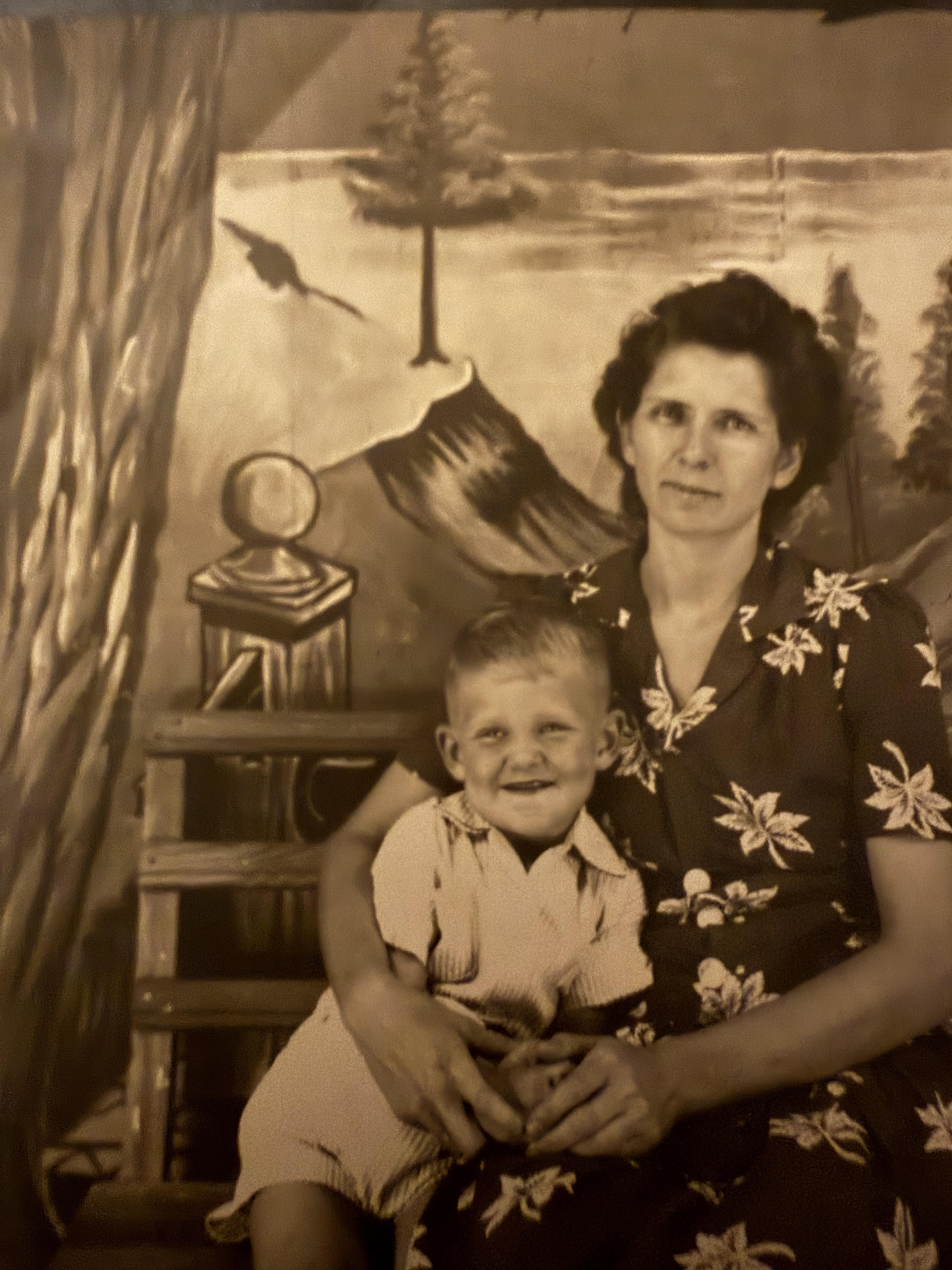 A woman holding a child