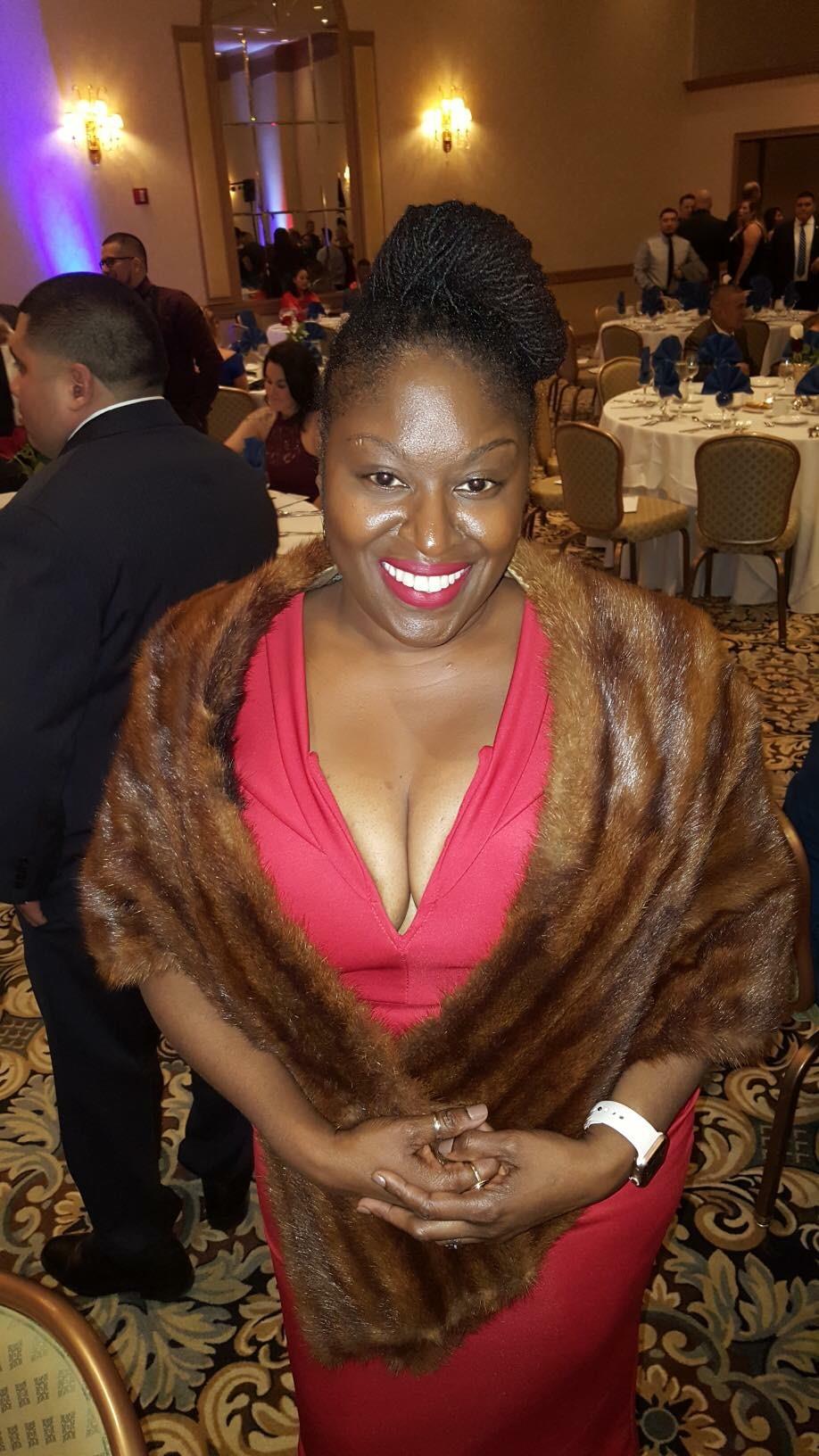 A woman in a fur cape