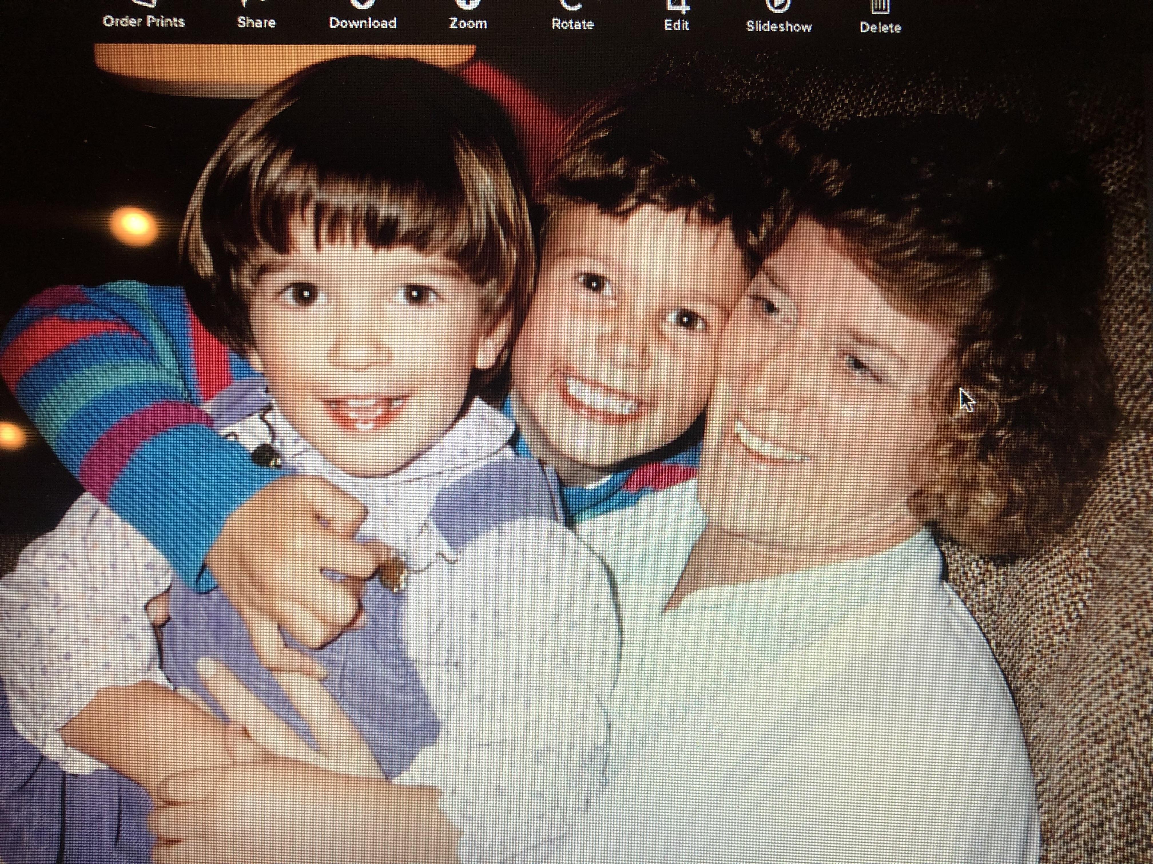 A woman and two children
