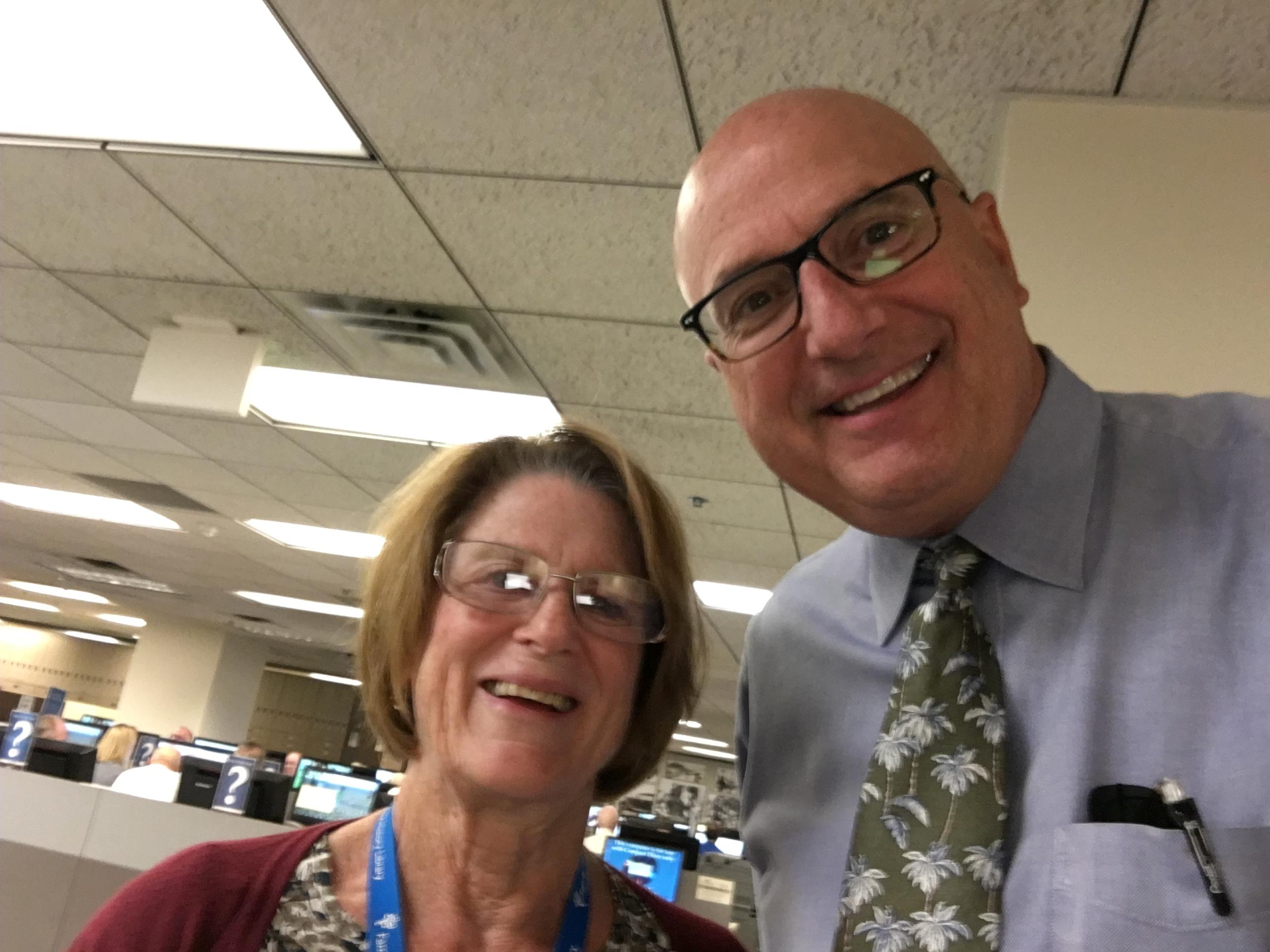 A man and woman smiling for a picture
