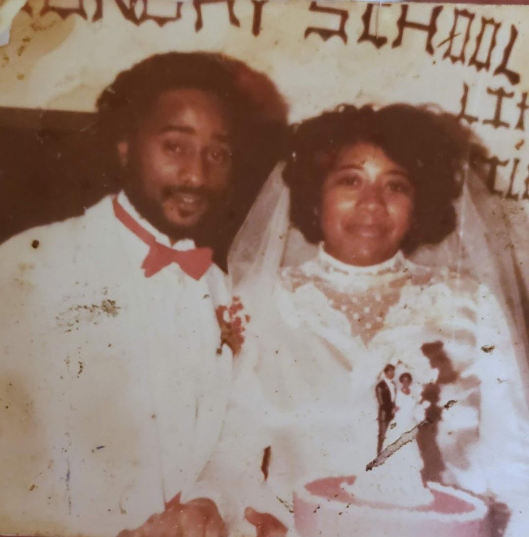 A man and woman in wedding attire