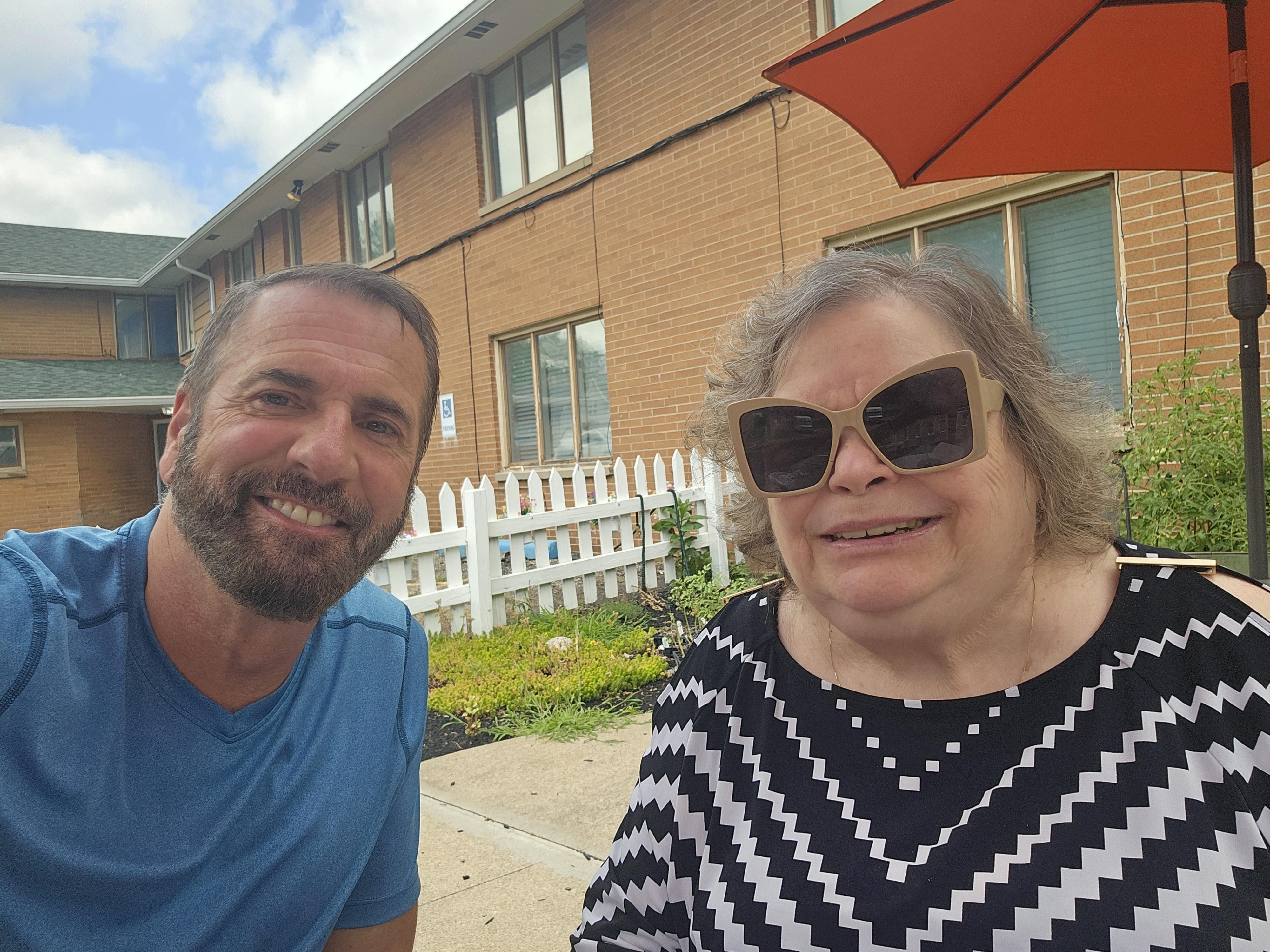 A man and woman smiling for a picture