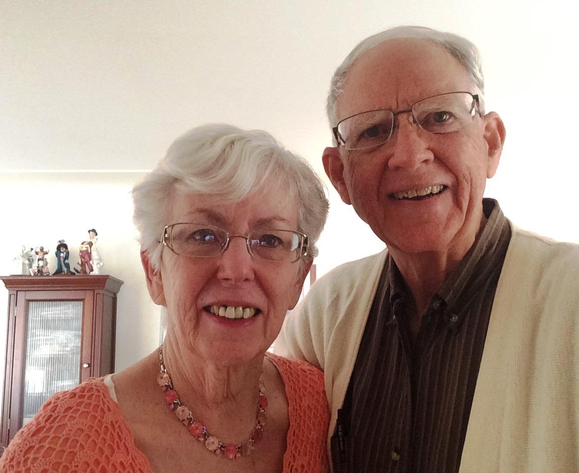 A man and woman smiling for a picture