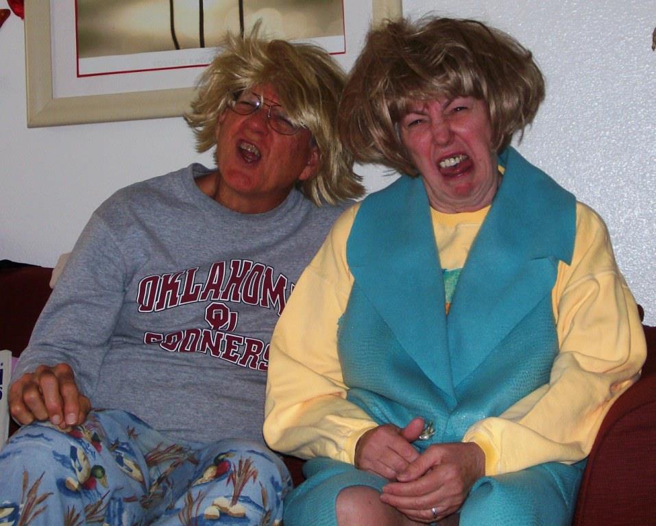 A man and woman sitting on a couch
