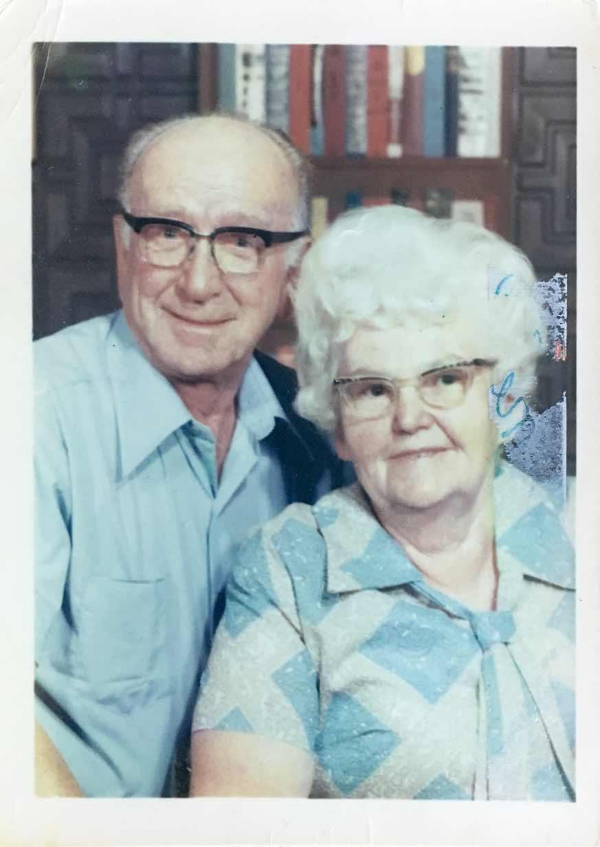 A man and woman posing for a picture