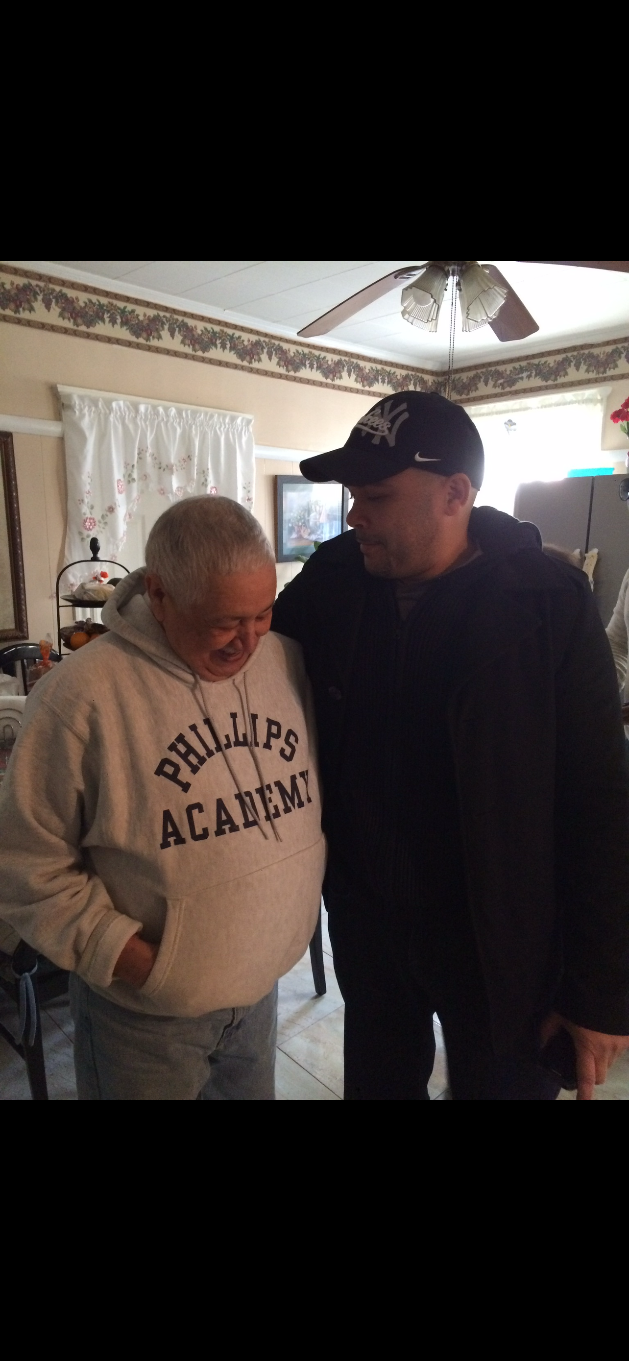 A man standing next to a man