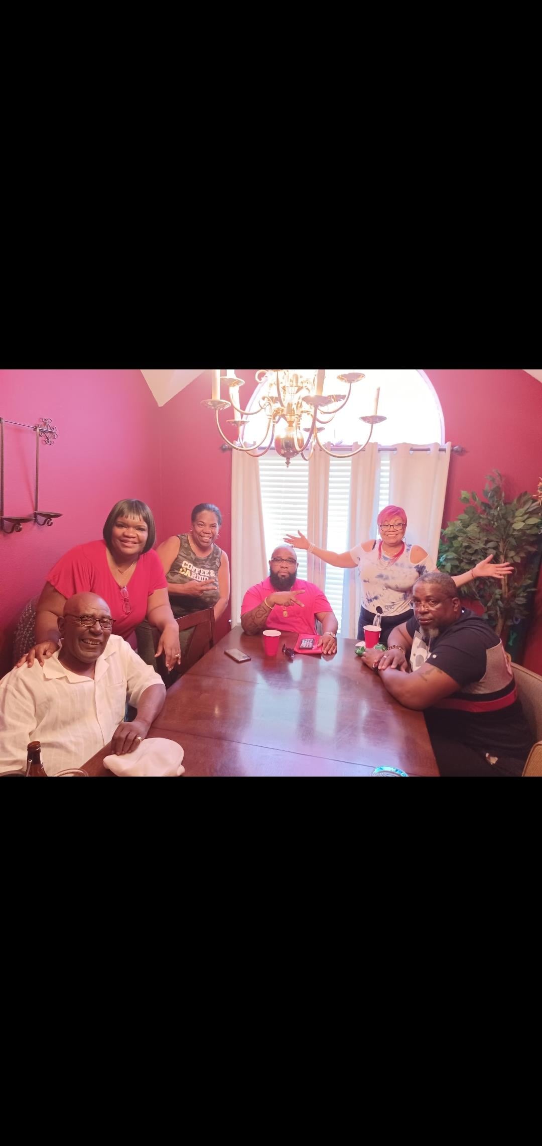 A group of people sitting around a table