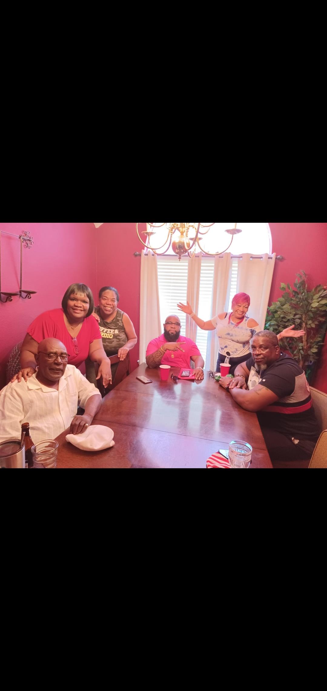 A group of people sitting around a table