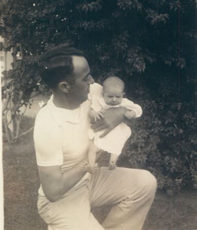 A man holding a baby