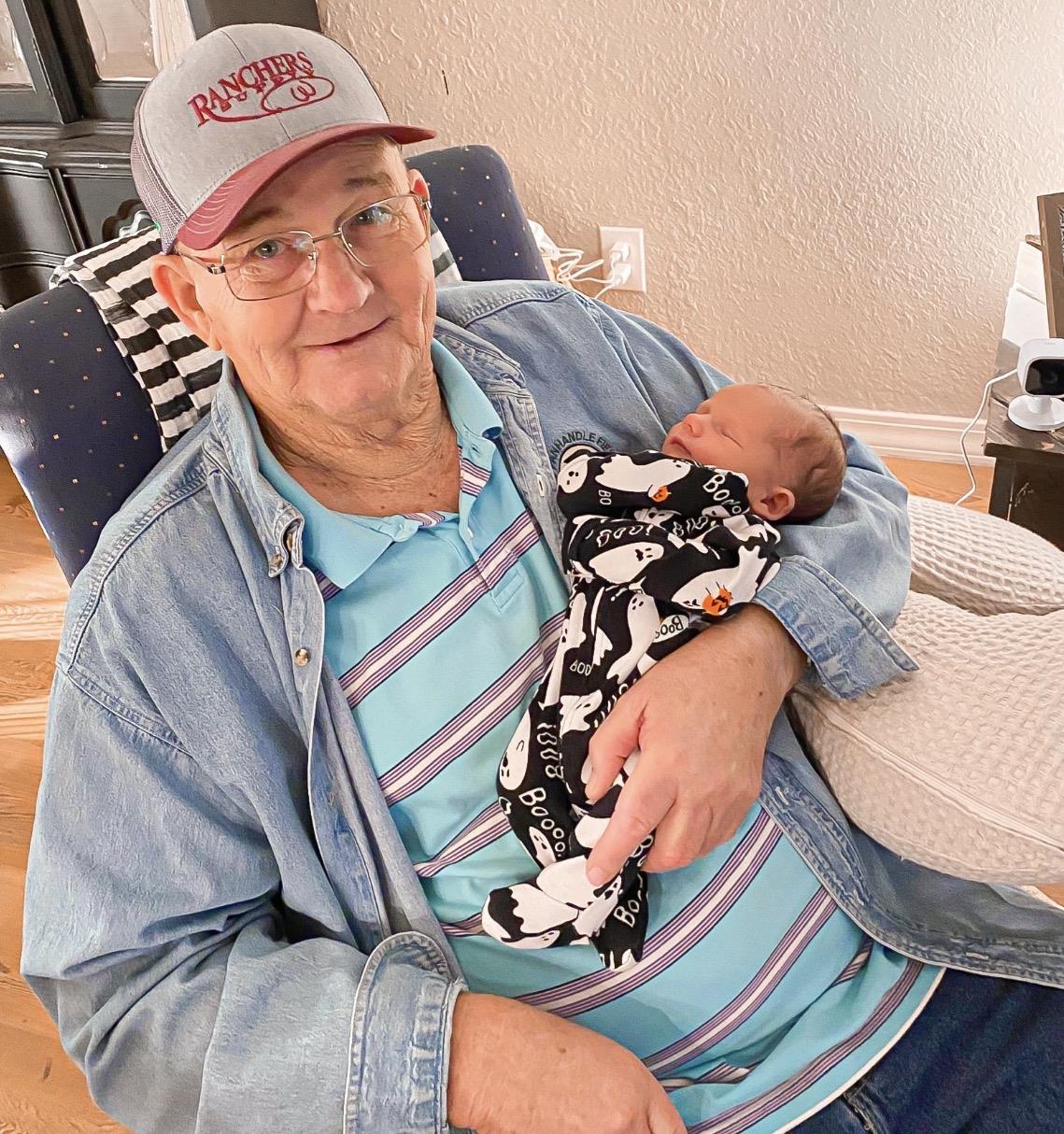 A man holding a baby