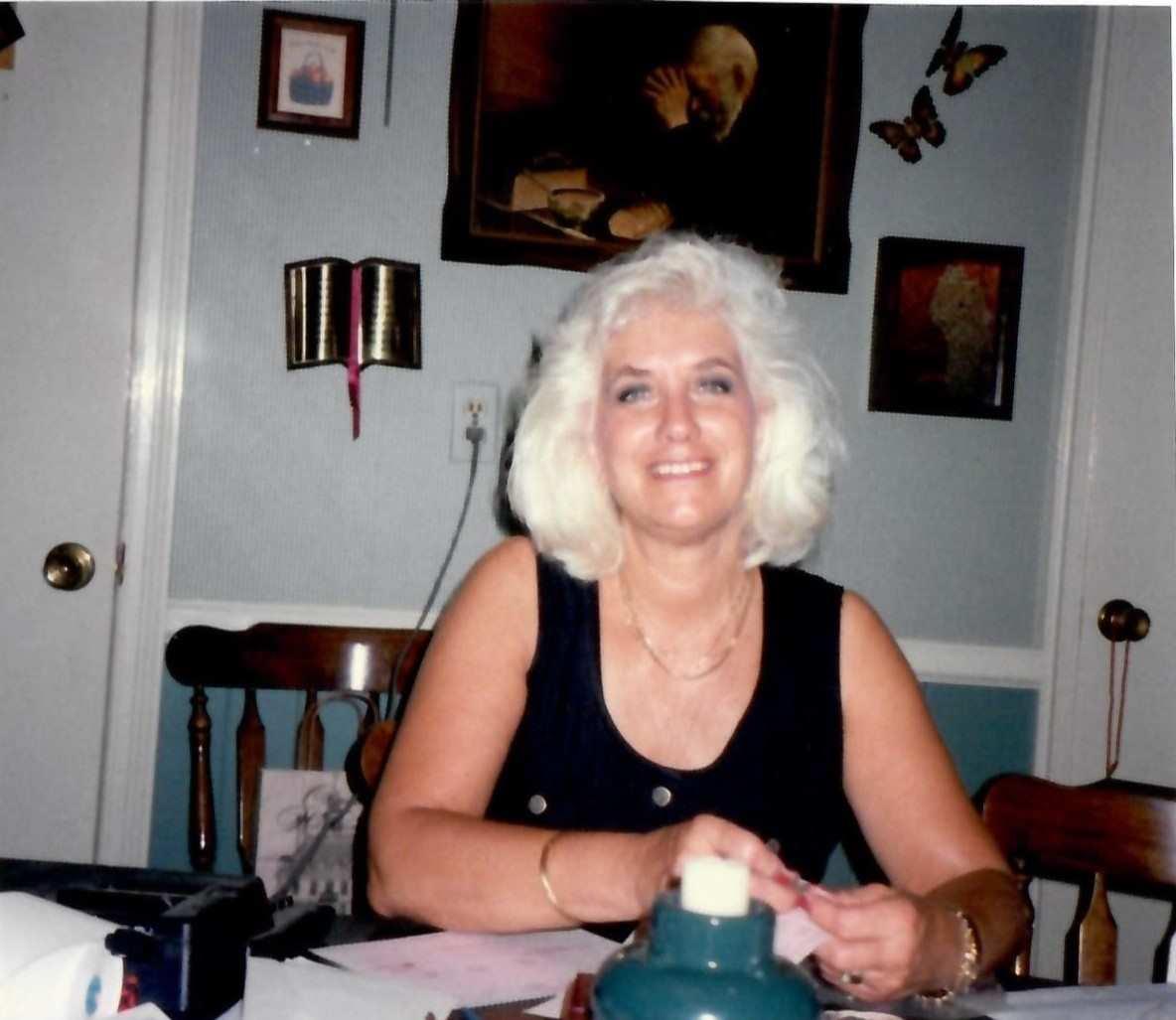 A woman sitting at a table