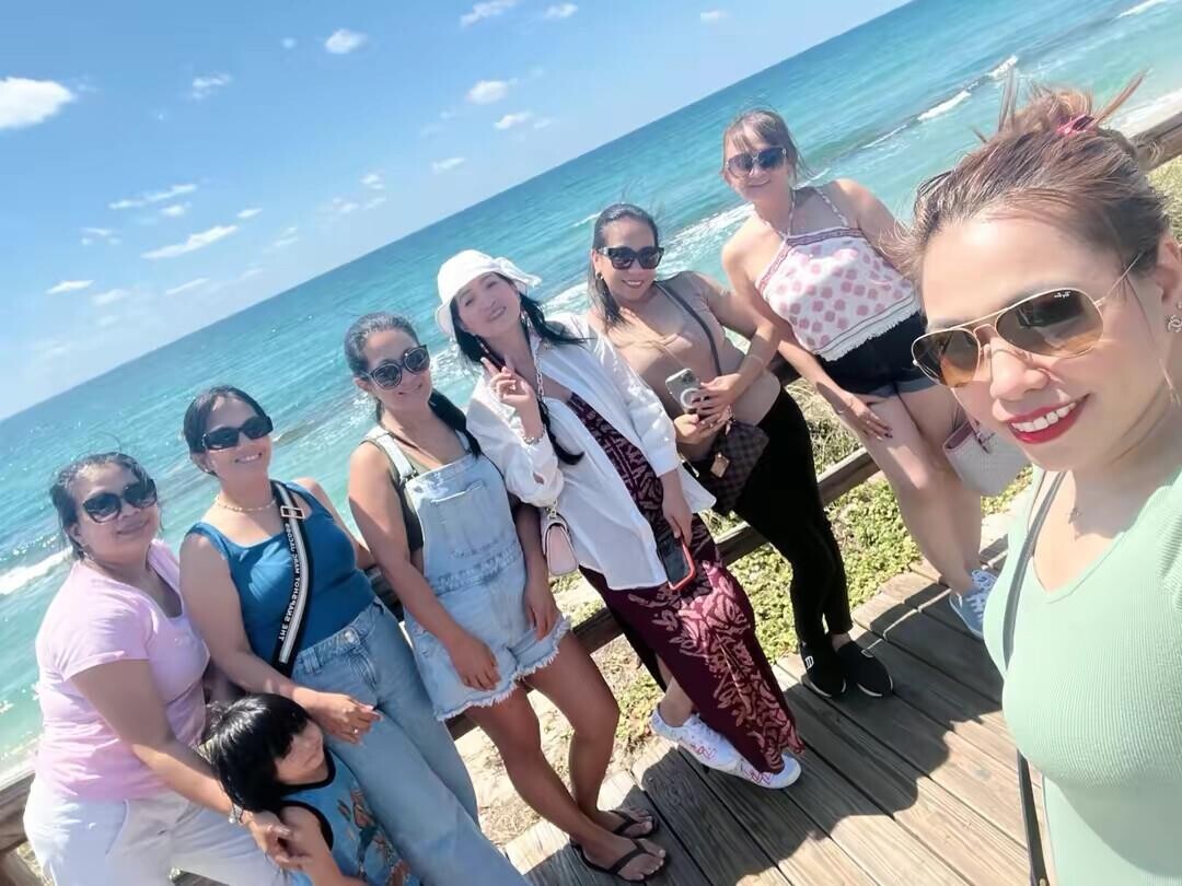 A group of women posing for a photo