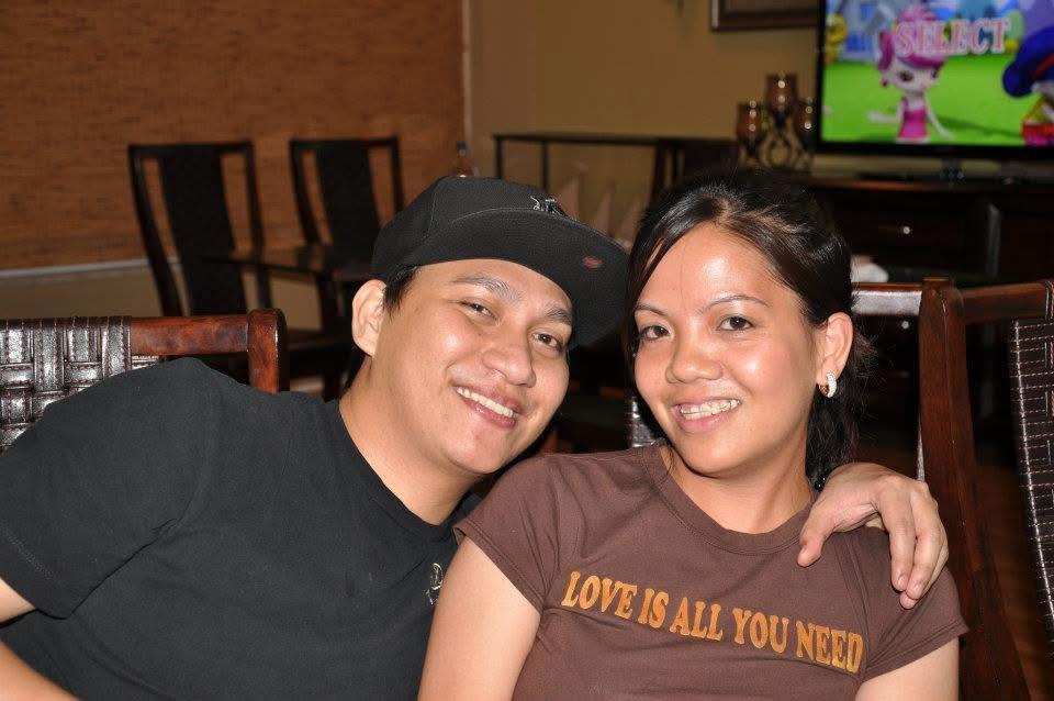 A man and woman smiling for a picture