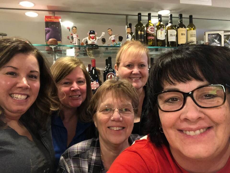 A group of women posing for a photo