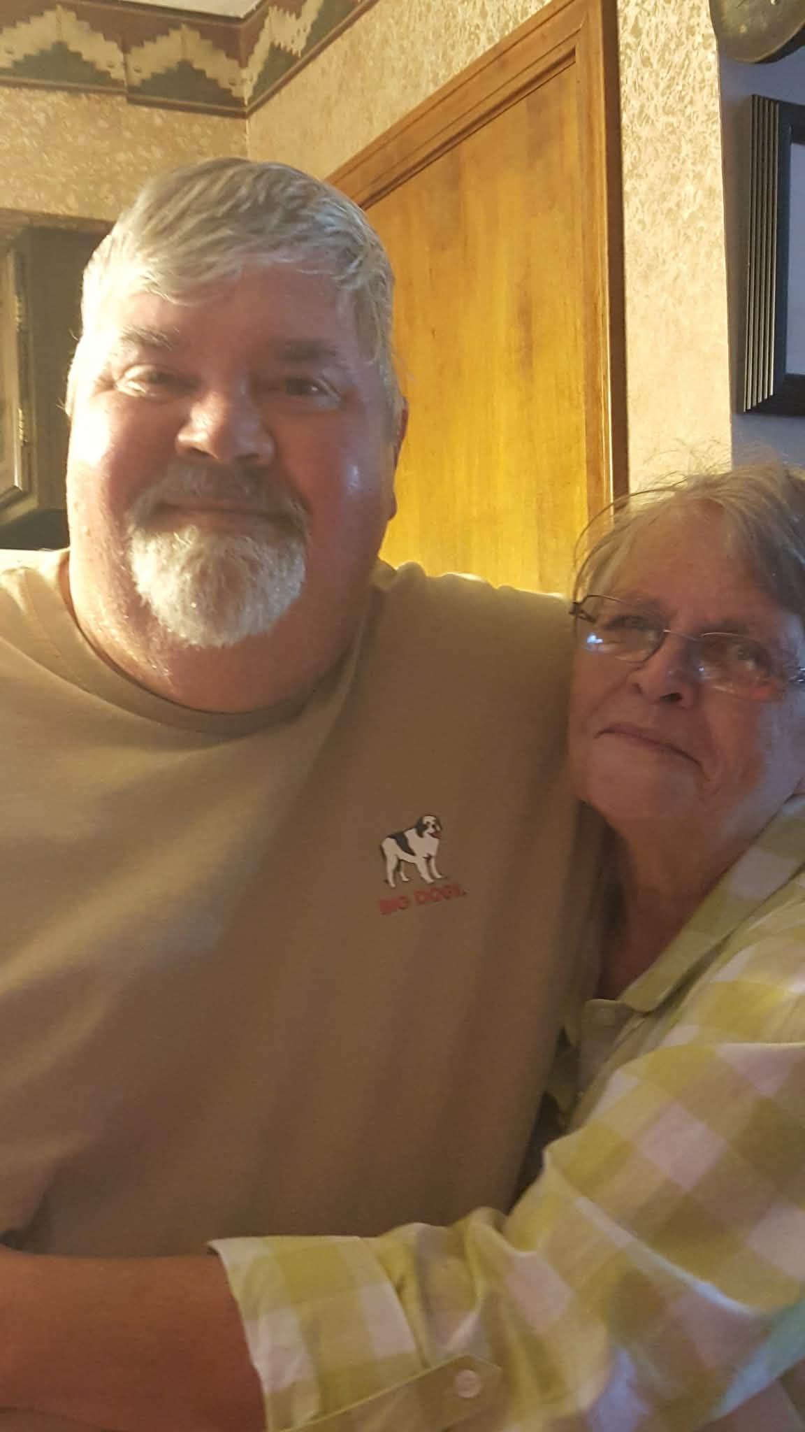 A man and woman taking a selfie