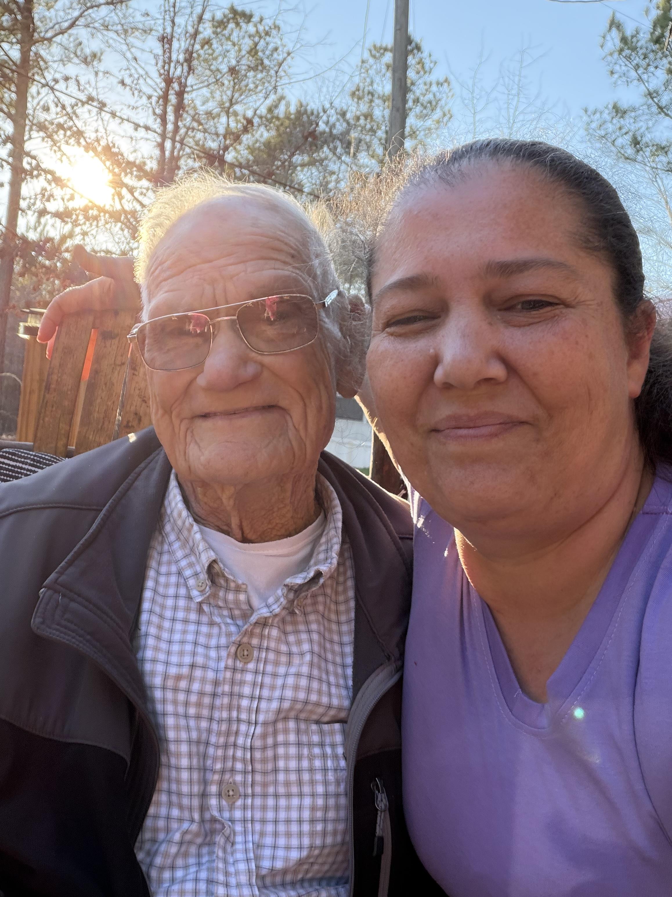A man and woman taking a selfie