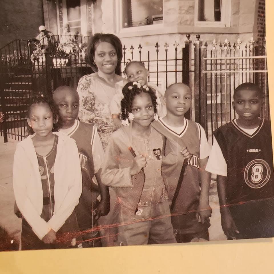 A group of children posing for a photo