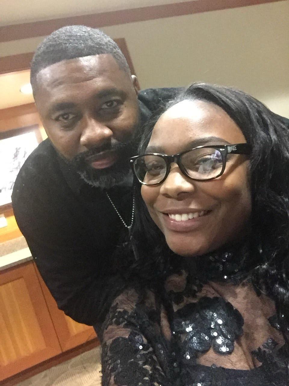 A man and woman taking a selfie