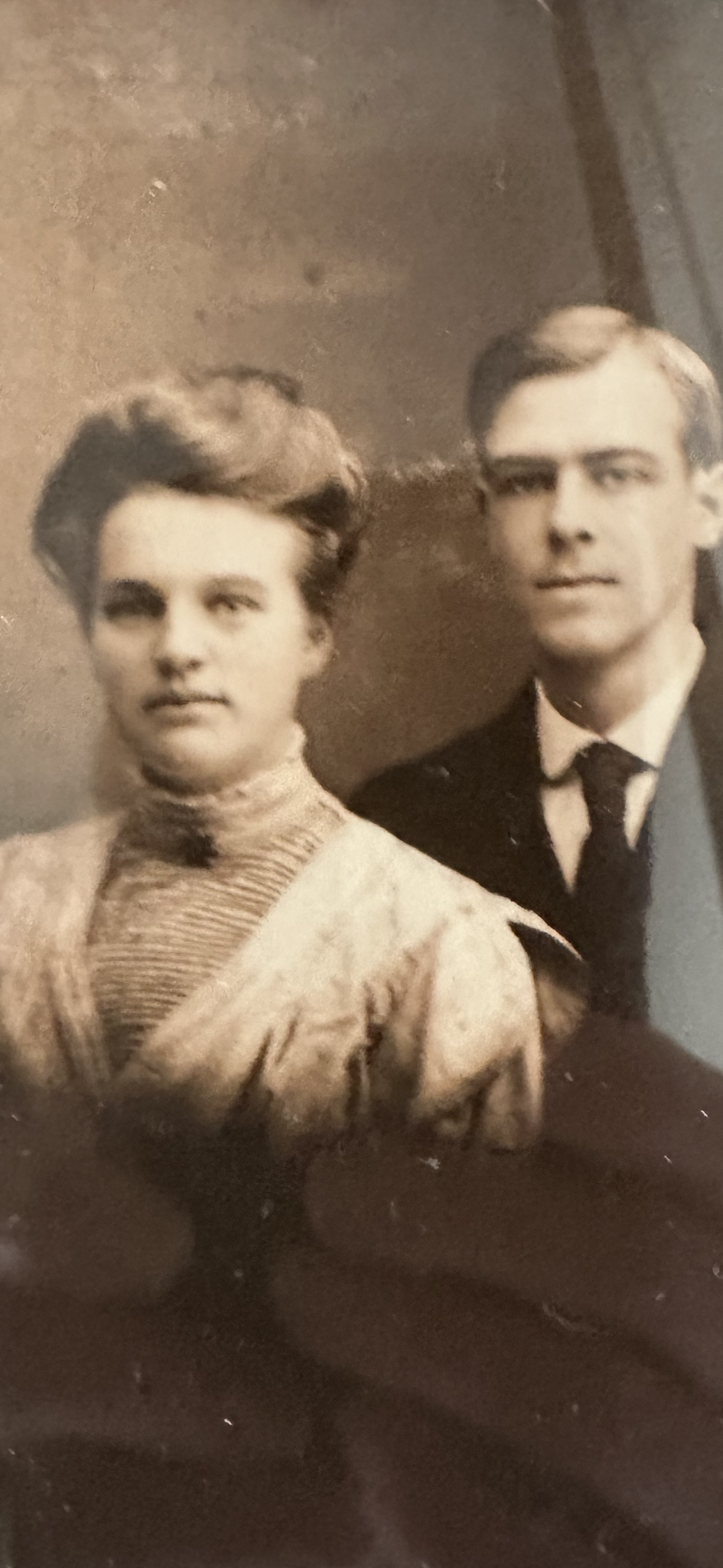 A man and woman posing for a picture