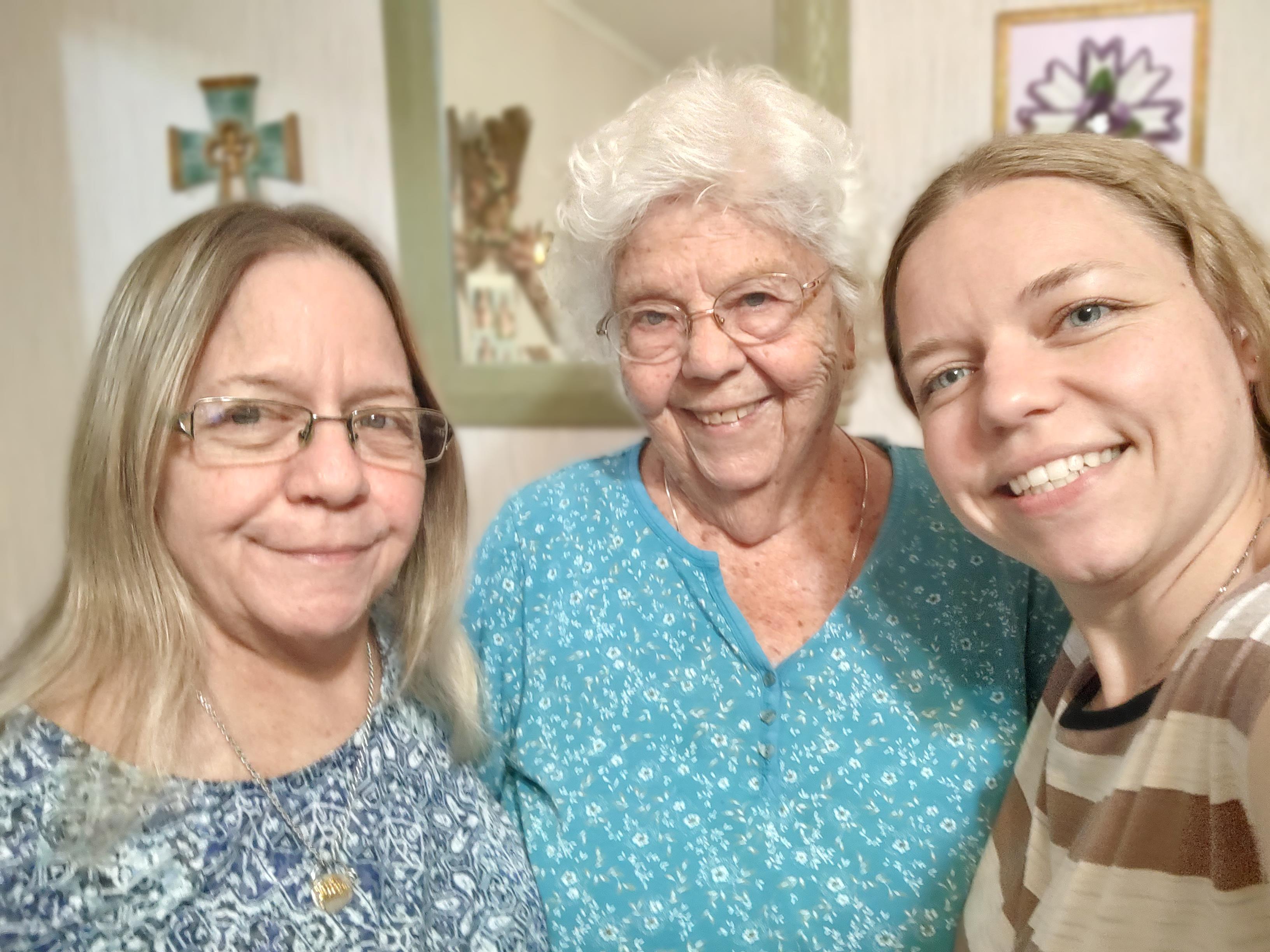 A group of women smiling for a selfie