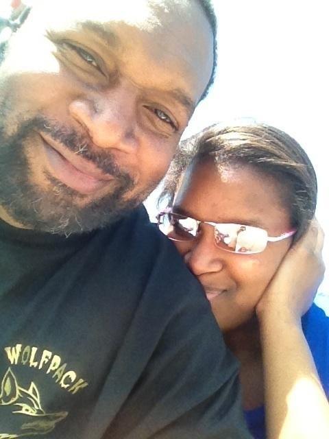 A man and woman taking a selfie