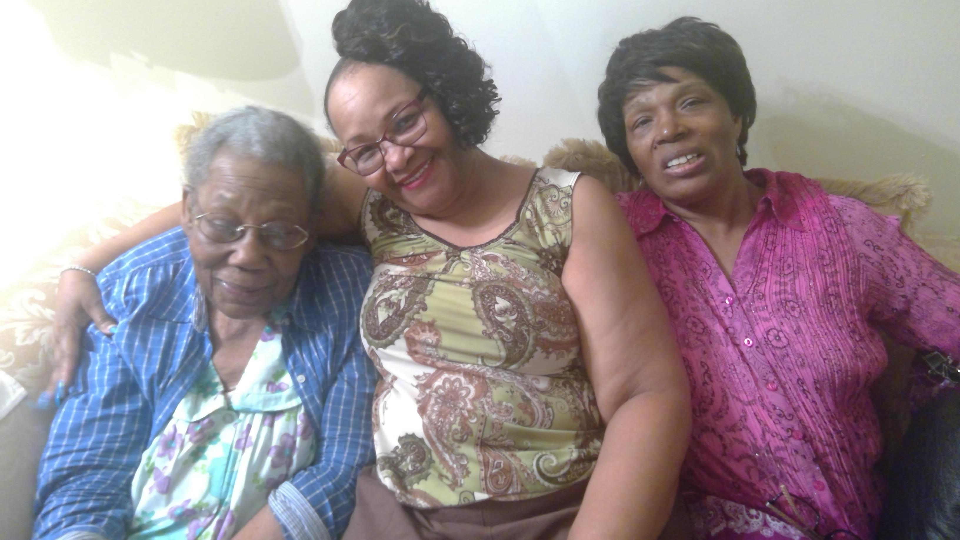 A group of women smiling for a photo