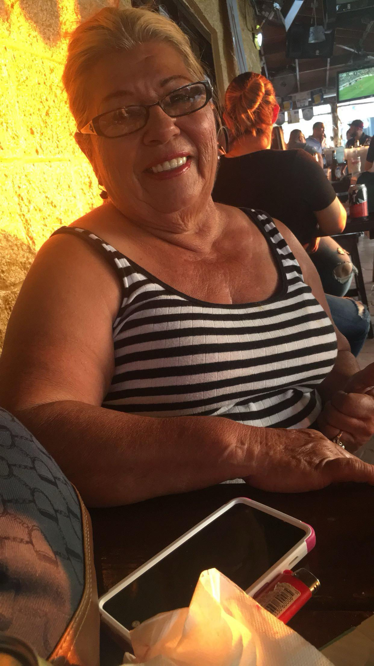 A woman smiling at camera